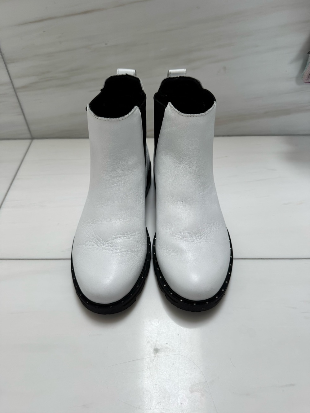 Sorel White Chelsea Ankle Boots with Black Studded Sole